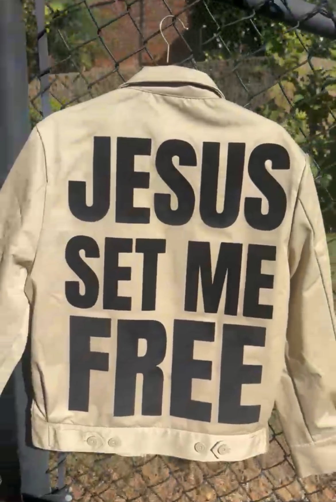 “Jesus Set Me Free” Tan Jacket