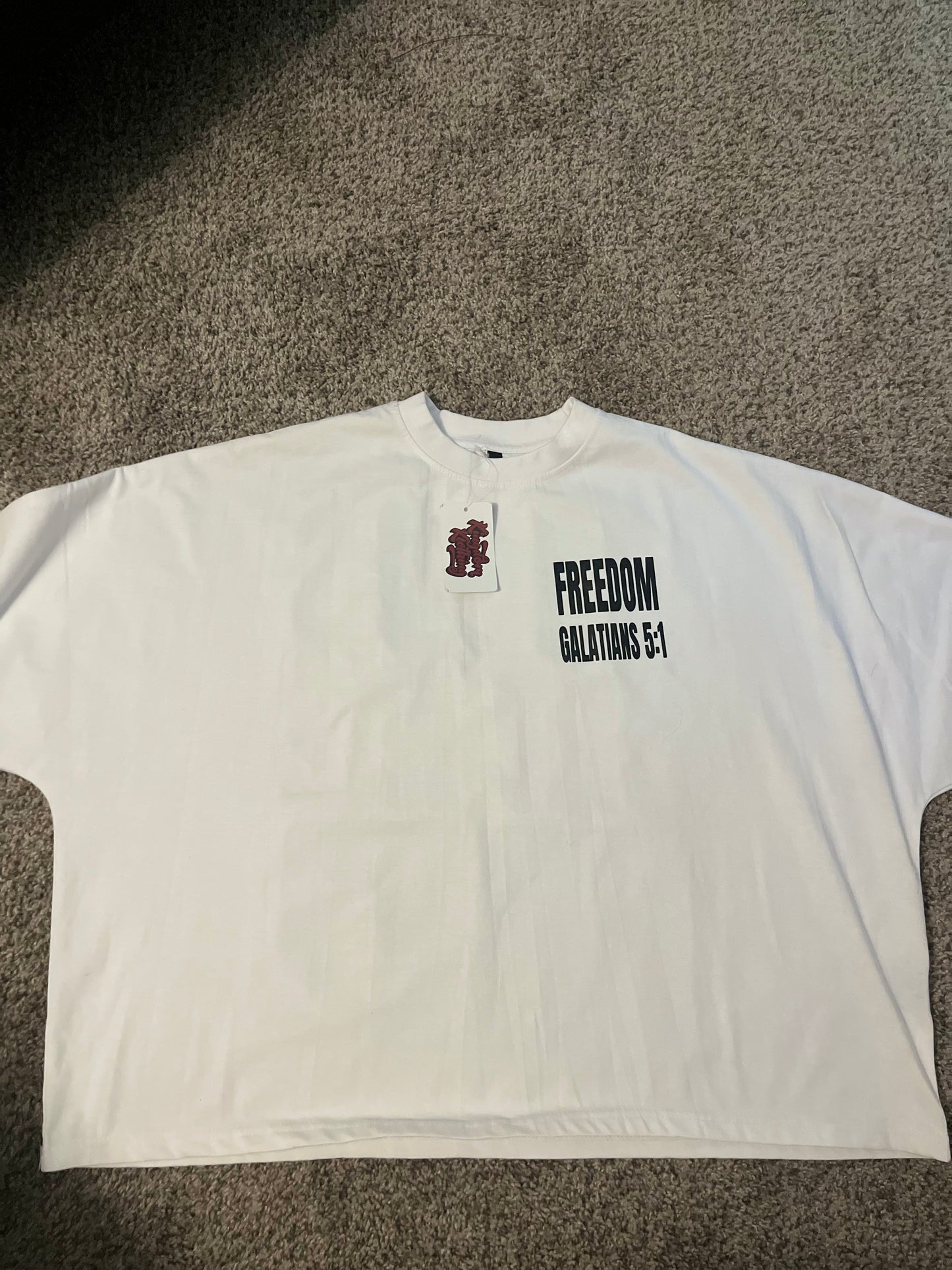 Oversized White “Jesus Set Me Free” Shirt