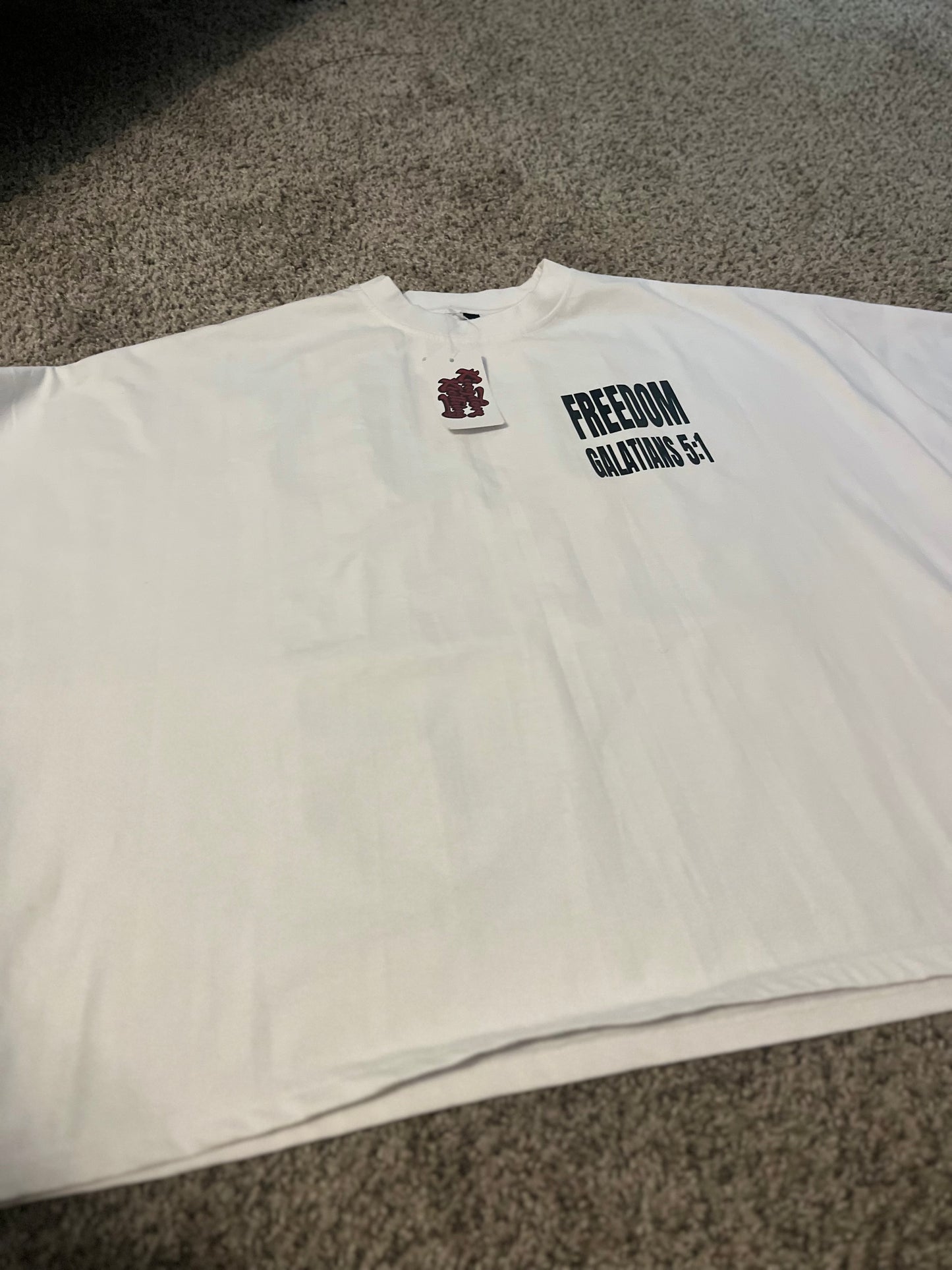 Oversized White “Jesus Set Me Free” Shirt